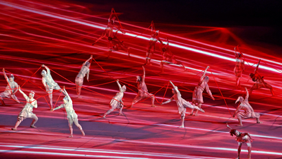 Dancers perform during the opening ceremony for the Tokyo 2020 Olympic Summer Games at Olympic Stadium