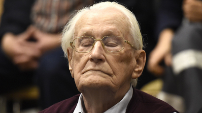 94-year-old former SS sergeant Oskar Groening listens to the verdict of his trial.