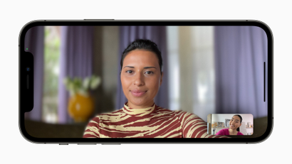 A person's face appears on a FaceTime call with portrait mode enabled. Their face is in sharp focus, while the background is blurry.