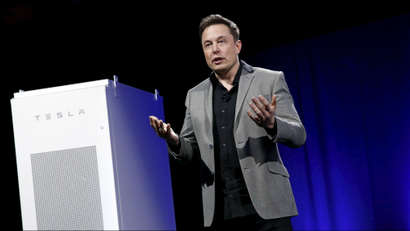 Tesla Motors CEO Elon Musk reveals a Tesla Energy battery for businesses and utility companies during an event in Hawthorne, California April 30, 2015.