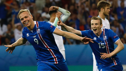 Iceland's Kolbeinn Sigthorsson celebrates after scoring his side's second goal during the Euro 2016 round of 16 soccer match between England and Iceland, at the Allianz Riviera stadium in Nice, France, Monday, June 27, 2016. (AP Photo/Claude Paris)