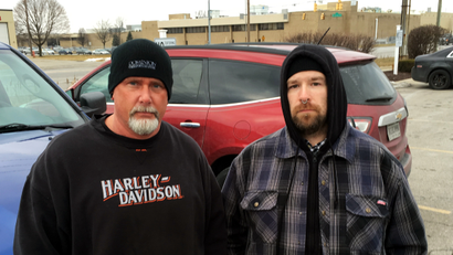 Brian Easton (left) and Brad Stepp, are two of 1,400 workers at Carrier Corporation (building in background) in Indianapolis, Indiana, February 17, 2016. Easton and Stepp stand to lose their job when the company moves production to Mexico. The Feb 9 announcement by United Technologies Corp's Carrier unit that it was shifting production to Mexico from the U.S. has thrust the long-term trend of U.S. manufacturing job decline to the foreground of the nation's election year agenda. Picture taken February 17, 2016.