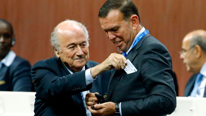 Juan Angel Napout of Paraguay receives his nomination at the Executive Committee from FIFA President Sepp Blatter (R) at the 65th FIFA Congress in Zurich, Switzerland, May 29, 2015.