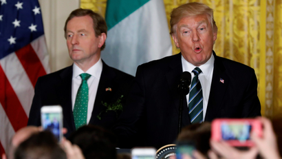 U.S. President Donald Trump (R) delivers remarks alongside Ireland's Prime Minister Enda Kenny