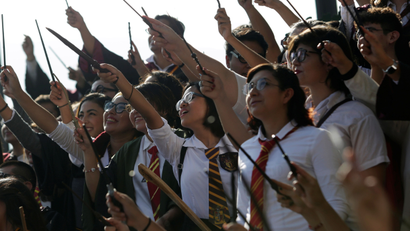 Fans dressed as Harry Potter participate in an event attempting to beat the previous Guinness World Record for the largest gathering of people dressed as Harry Potter, in Monterrey, Mexico