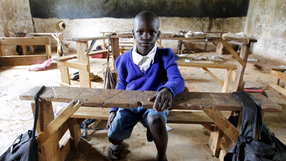 Seven-year-old Barack Obama Okoth, named after U.S. President Barack Obama, sits inside an empty classroom as he speaks with Reuters at the Senator Obama primary school in Nyangoma village in Kogelo ,west of Kenya's capital Nairobi, June 23, 2015. When Barack Obama visits Africa this month, he will be welcomed by a continent that had expected closer attention from a man they claim as their son, a sentiment felt acutely in the Kenyan village where the 44th U.S. president's father is buried. Picture taken June 23, 2015.