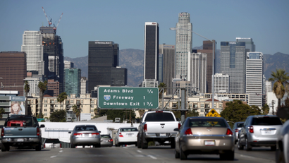The downtown Los Angeles skyline is seen with a clear sky from the 110 freeway in Los Angeles, California, United States, November 12, 2015. El Nino storms brought summer rain which led to less smog in the city this year than last, according to the South Coast Air Quality Management District. REUTERS/Lucy Nicholson - GF20000057327