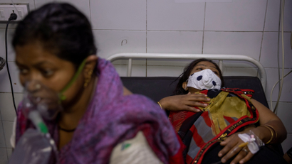 Patients suffering from the coronavirus disease (COVID-19) get treatment at the casualty ward in Lok Nayak Jai Prakash (LNJP) hospital, amidst the spread of the disease in New Delhi