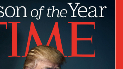 U.S. President-elect Donald Trump poses on the cover of Time Magazine after being named its person of the year
