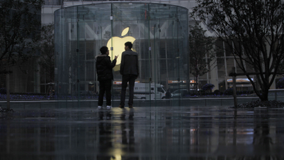 People outside an Apple store in Shanghai.