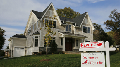 A real estate sign advertising a new home for sale is pictured in Vienna, Virginia, US