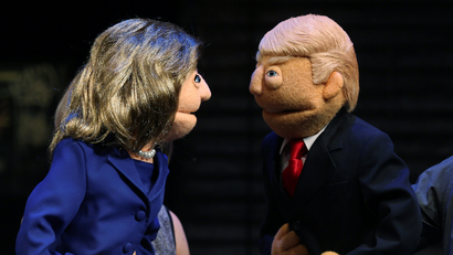 Puppets in the likeness of Democratic presidential nominee Hillary Clinton and Republican presidential nominee Donald Trump face-off after a mock Avenue Q sponsored debate in the Manhattan borough of New York
