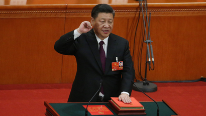Chinese President Xi Jinping with his hand on the Constitution swears after he is voted as the president for a second term at the fifth plenary session of the first session of the 13th National People's Congress (NPC) at the Great Hall of the People in Beijing, China, 17 March 2018. The NPC has over 3,000 delegates and is the world's largest parliament or legislative assembly though its function is largely as a formal seal of approval for the policies fixed by the leaders of the Chinese Communist Party. The NPC runs alongside the annual plenary meetings of the Chinese People's Political Consultative Conference (CPPCC), together known as 'Lianghui' or 'Two Meetings'.