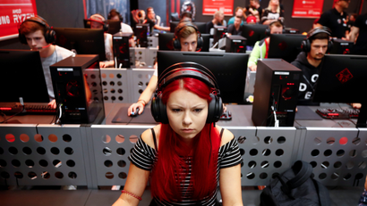 Gamers focus during a gaming competition