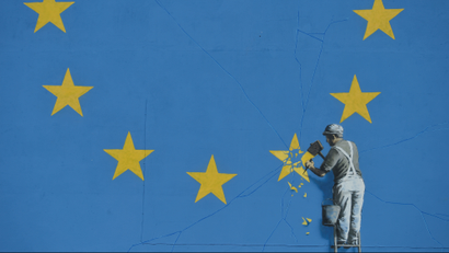 Banksy artwork in Dover depicting a workman chipping away at one of the 12 stars on the flag of the European Union
