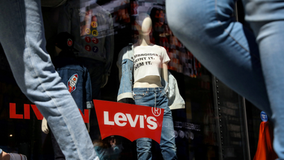 People pass by a Levi Strauss store in New York City