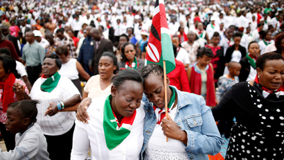 Kenyans pray during a rally calling for peace ahead of Kenya's August 8 election in Nairobi, Kenya July 30