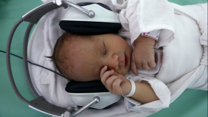 baby with headphones