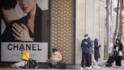 Shoppers line up outside a Chanel store in Seoul, South Korea.