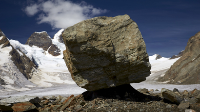 A giant rock on a glacier