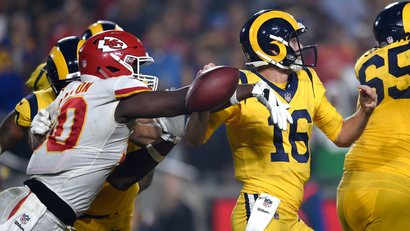 Kansas City Chiefs outside linebacker Justin Houston, left, strips the ball away from Los Angeles Rams quarterback Jared Goff (16) during the second half of an NFL football game, Monday, Nov. 19, 2018, in Los Angeles. Chiefs defensive end Allen Bailey recovered the ball and scored a touchdown.