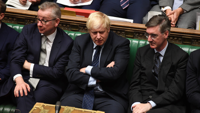 Britain's Prime Minister Boris Johnson, Chancellor of the Duchy of Lancaster Michael Gove (L), and leader of the House of Commons Jacob Rees-Mogg (R) attend in the House of Commons in London, Britain September 3, 2019.