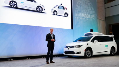 John Krafcik, CEO of Waymo Inc., the autonomous vehicle company created by Google's parent company, introduces a Chrysler Pacifica hybrid outfitted with Waymo's own suite of sensors and radar at the North American International Auto Show in Detroit, Sunday, Jan. 8, 2017.