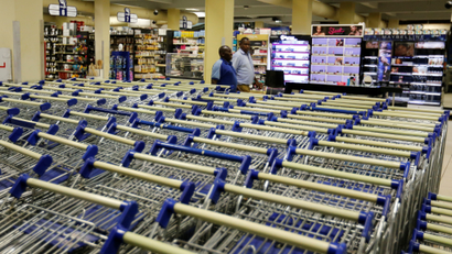 Shopping trolleys are seen arranged inside the Nakumatt supermarket within the Village market complex mall, in Nairobi, Kenya.