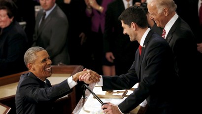 U.S. President Barack Obama (L) is greeted by Speaker of the House Paul Ryan (R) as he arrives to deliver his State of the Union address to a joint session of Congress in Washington, January 12, 2016.