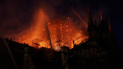 Notre Dame burning.
