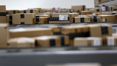 Packaged products that are ready for shipment are seen at an Amazon Fulfilment Center