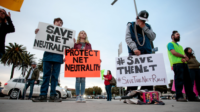 Supporters of Net Neutrality protest the FCC's recent decision to repeal the program in Los Angeles