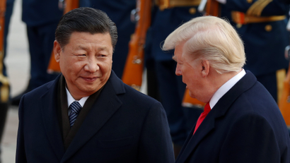 U.S. President Donald Trump takes part in a welcoming ceremony with China's President Xi Jinping at the Great Hall of the People in Beijing, China, November 9, 2017.