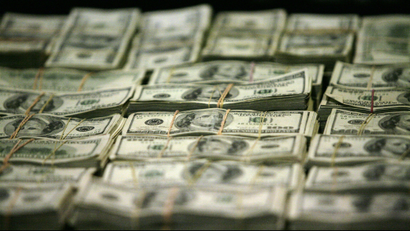 Stacks of U.S. hundred dollar bills.