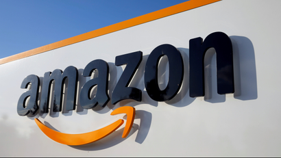 Amazon's logo is seen at one of its logistics centers