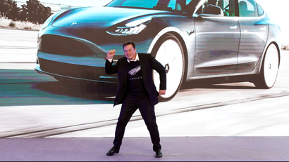 Tesla Inc CEO Elon Musk dances onstage during a delivery event for Tesla China-made Model 3 cars in Shanghai, China January 7, 2020.