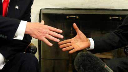 donald trump and barack obama shake hands handshake