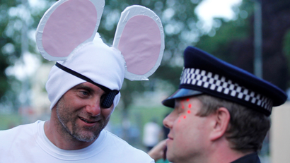 A man dressed as a mouse.