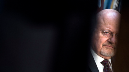 Director of National Intelligence James R. Clapper listens during a retirement ceremony at the National Security Agency in Fort Meade, Maryland March 28, 2014.