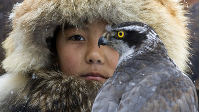 A hunter with a hawk in Kazakhstan