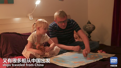 American journalist Eric Nilsson working for China's state-owned media China Daily explains "One Belt One Road" to his five-year-old daughter