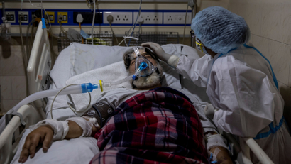 A Picture and its Story: Witnessing COVID chaos in India's hospitals, graveyards and crematoriums
