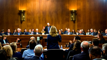 Christine Blasey Ford is sworn in by Senate Judiciary Committee chairman Chuck Grassley, R-Iowa, to testify before the Senate Judiciary Committee on Capitol Hill in Washington, Thursday, Sept. 27, 2018.