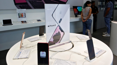 Apple iPhone X mobile phones are seen at an Apple reseller store in Mumbai
