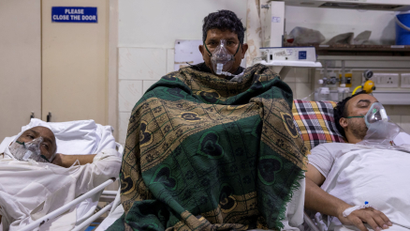 Patients suffering from the coronavirus disease (COVID-19) receive treatment inside the emergency ward at Holy Family hospital in New Delhi