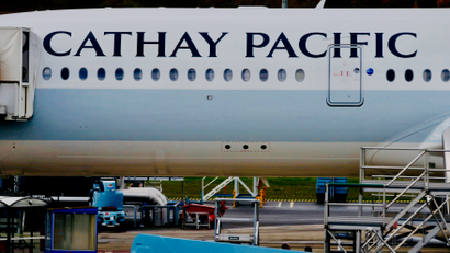 A passenger plane of Cathay Pacific Airways parks at the airport in Colomiers near Toulouse.
