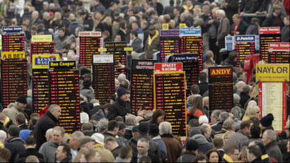 Bookmakers boards are seen at the Cheltenham Festival horse racing meet in Gloucestershire, western England March 16, 2012.