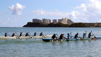 Guam's national rowing team practice on the waters off Tamuning City on the island of Guam, a U.S. Pacific Territory, August 12, 2017.
