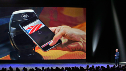 tim cook shows off apple pay