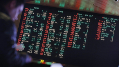 Odds are displayed on a screen at a sports book owned and operated by CG Technology in Las Vegas.